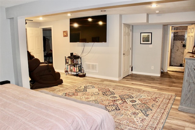 111 S 3rd Ave, Huxley, IA 50124 - bedroom with wood finished floors and recessed lighting