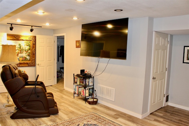 111 S 3rd Ave, Huxley, IA 50124 - living room with wood finished floors and recessed lighting
