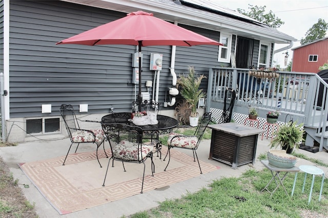 111 S 3rd Ave, Huxley, IA 50124 - view of patio / terrace featuring a wooden deck