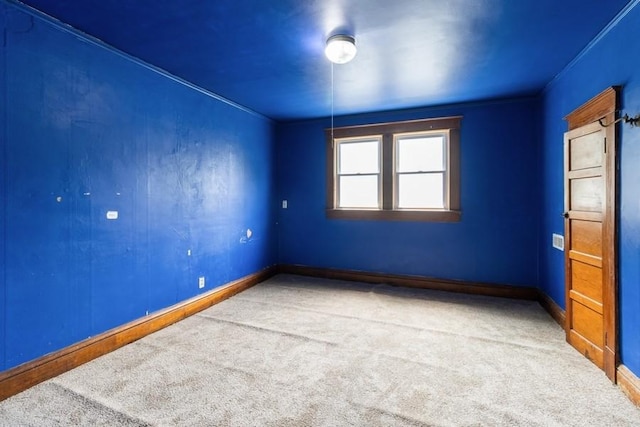 1236 York St, Des Moines, IA 50316 - unfurnished room featuring carpet floors and crown molding