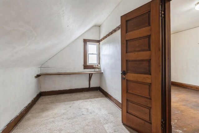 1236 York St, Des Moines, IA 50316 - bonus room featuring lofted ceiling and baseboards
