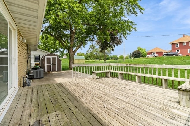 202 Harrison Ct, Baxter, IA 50028 - deck featuring a storage unit and a fenced backyard