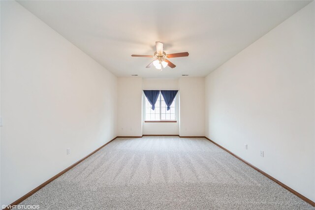 1624 NW Prairie Lakes Dr Unit 4, Ankeny, IA 50023 - spare room with a ceiling fan and light carpet