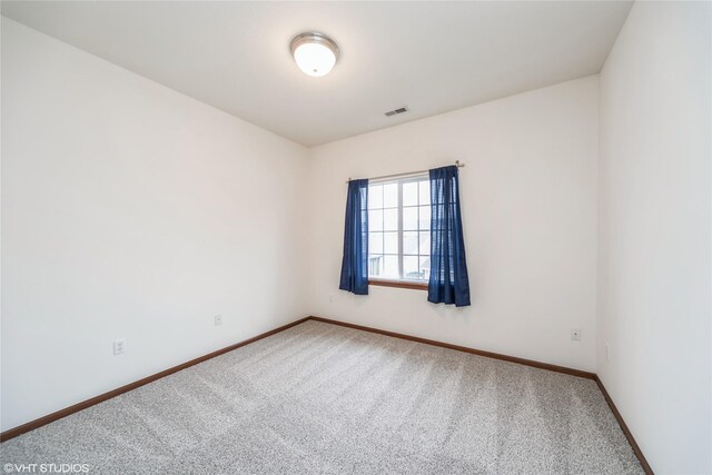 1624 NW Prairie Lakes Dr Unit 4, Ankeny, IA 50023 - carpeted spare room featuring baseboards