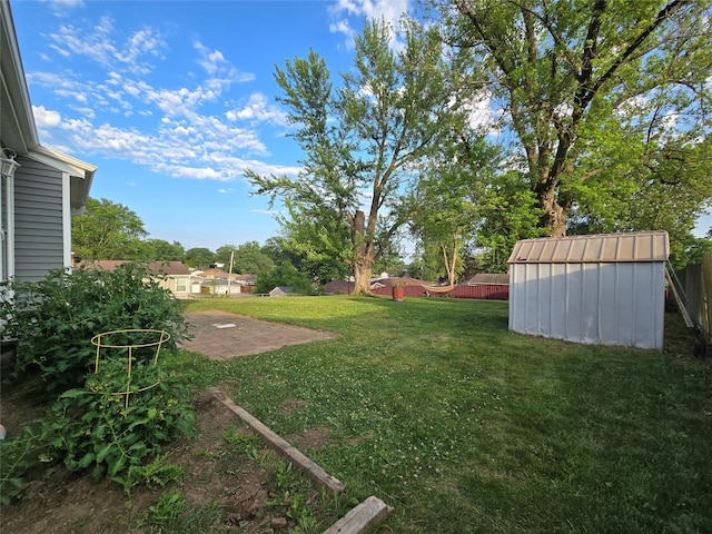 335 Palomino Pkwy, Des Moines, IA 50320 - view of yard with a storage shed and a patio
