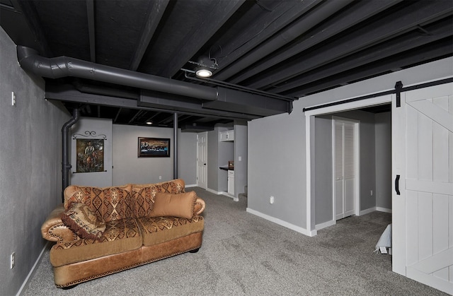 57 SE Meadowlark Ct, Waukee, IA 50263 - carpeted living room with baseboards and a barn door