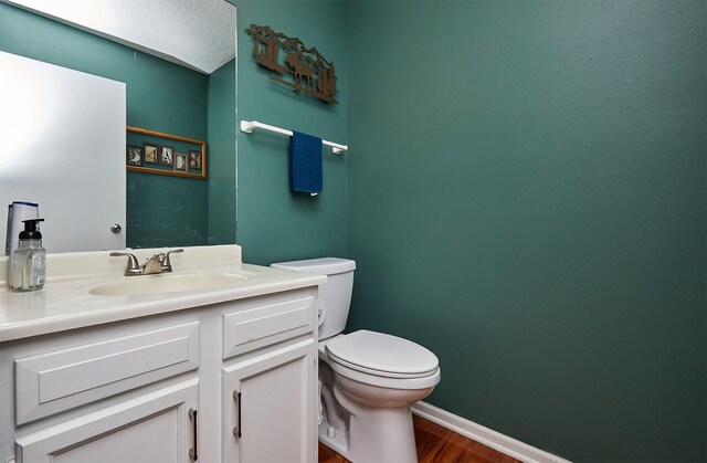 57 SE Meadowlark Ct, Waukee, IA 50263 - bathroom with wood finished floors and vanity