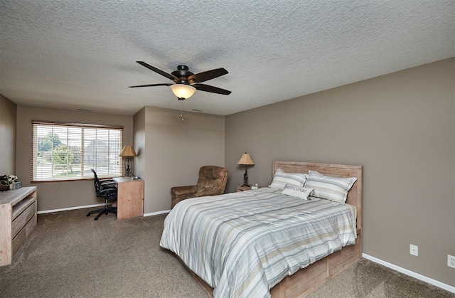 57 SE Meadowlark Ct, Waukee, IA 50263 - bedroom featuring carpet flooring, ceiling fan, an office area, and a textured ceiling
