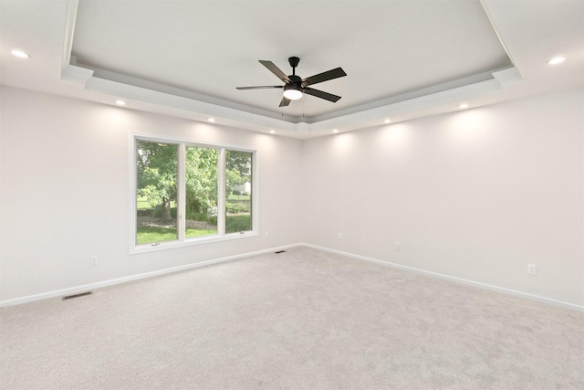 8151 Chambery Blvd, Johnston, IA 50131 - carpeted spare room featuring a raised ceiling, recessed lighting, and ceiling fan