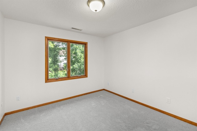 8151 Chambery Blvd, Johnston, IA 50131 - carpeted empty room with baseboards and a textured ceiling