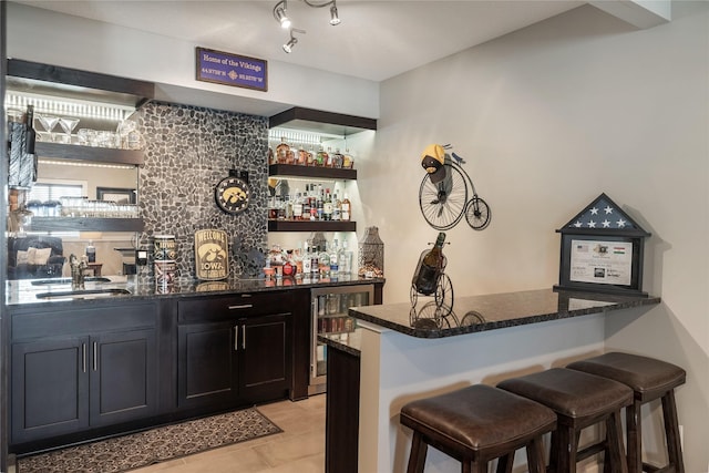 3210 NE 17th St, Ankeny, IA 50021 - indoor wet bar featuring wine cooler and light tile patterned floors