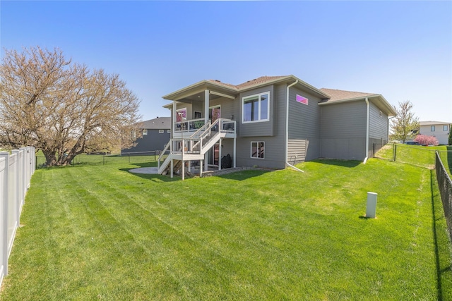 3210 NE 17th St, Ankeny, IA 50021 - rear view of property featuring a fenced backyard and stairs