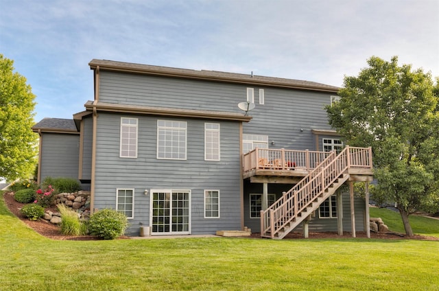 12602 Winston Ave, Urbandale, IA 50323 - back of house featuring a deck, stairs, and a lawn