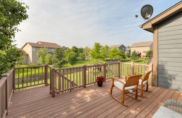 12602 Winston Ave, Urbandale, IA 50323 - wooden terrace featuring a residential view and a yard