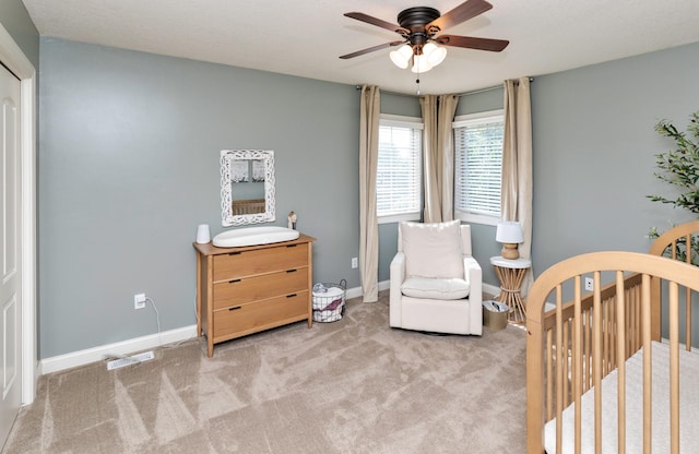 12602 Winston Ave, Urbandale, IA 50323 - bedroom featuring carpet flooring and ceiling fan