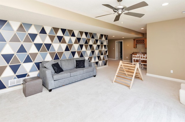 12602 Winston Ave, Urbandale, IA 50323 - living room with carpet, recessed lighting, a ceiling fan, and an accent wall