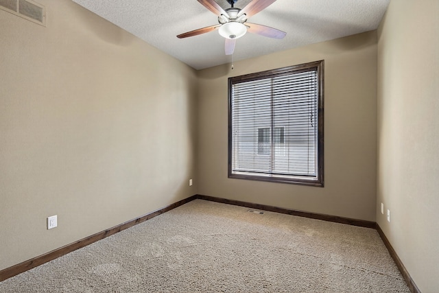 300 NW Sunset Ln, Grimes, IA 50111 - empty room with light carpet, ceiling fan, and a textured ceiling