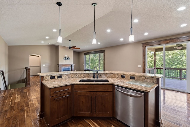 300 NW Sunset Ln, Grimes, IA 50111 - kitchen featuring a ceiling fan, a textured ceiling, dishwasher, lofted ceiling, and dark wood-style floors