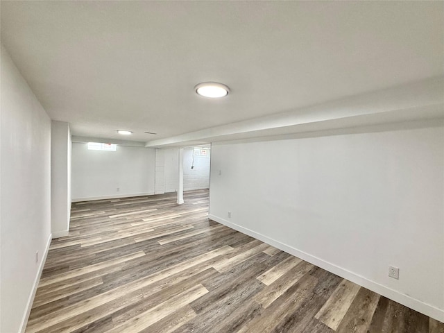 2000 E 21st St, Des Moines, IA 50317 - basement featuring wood finished floors and baseboards