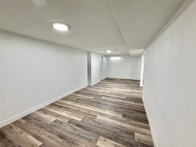 2000 E 21st St, Des Moines, IA 50317 - finished below grade area featuring baseboards and wood finished floors
