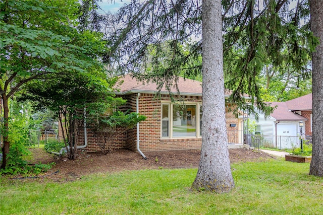 4008 Douglas Ave, Des Moines, IA 50310 - view of front of property with brick siding and roof with shingles