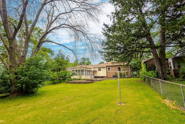 4008 Douglas Ave, Des Moines, IA 50310 - view of yard with a sunroom