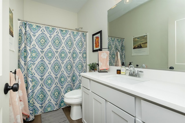 1302 S L Ct, Indianola, IA 50125 - bathroom with vanity, wood finished floors, and curtained shower