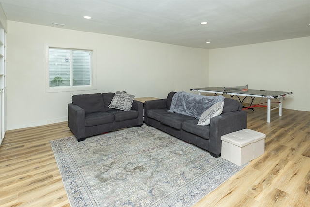 1302 S L Ct, Indianola, IA 50125 - living area featuring wood finished floors and recessed lighting
