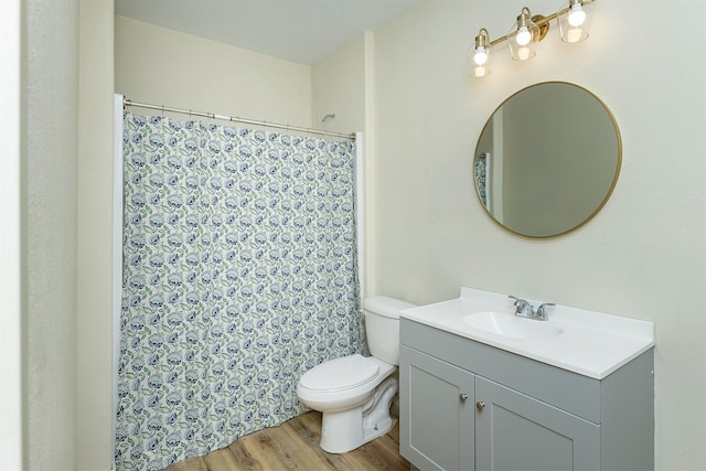 1302 S L Ct, Indianola, IA 50125 - bathroom featuring vanity, wood finished floors, and curtained shower