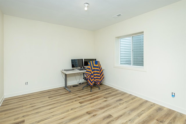 1302 S L Ct, Indianola, IA 50125 - office area with wood finished floors and baseboards