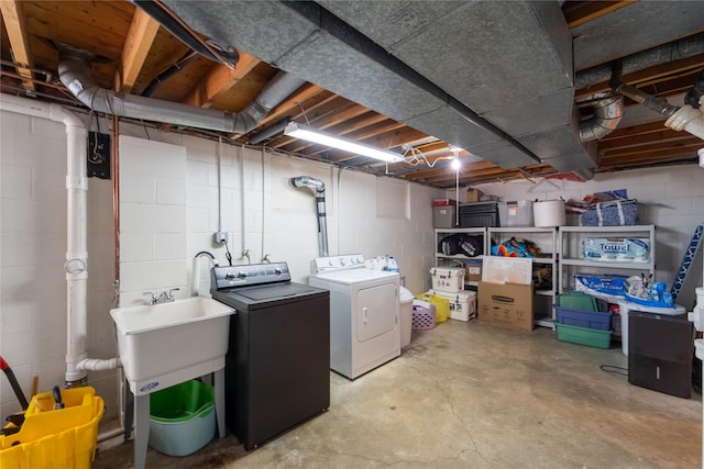 912 23rd St, West Des Moines, IA 50265 - unfinished below grade area featuring washer and clothes dryer and concrete block wall