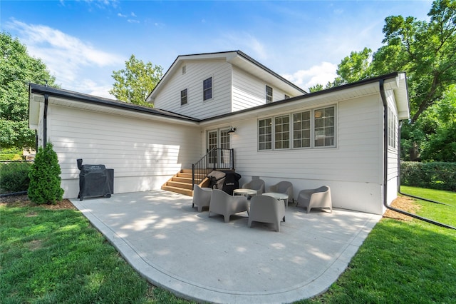 912 23rd St, West Des Moines, IA 50265 - back of property featuring a patio and a yard