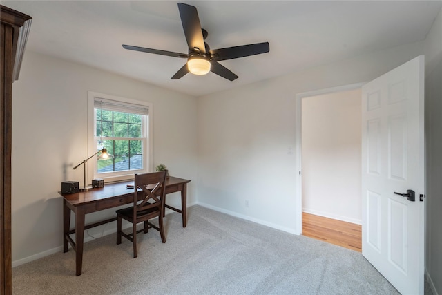 912 23rd St, West Des Moines, IA 50265 - home office featuring a ceiling fan and light colored carpet