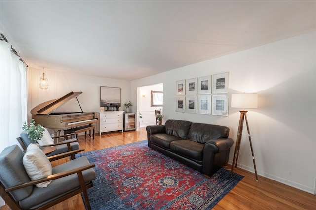 912 23rd St, West Des Moines, IA 50265 - living room featuring wood finished floors and wine cooler