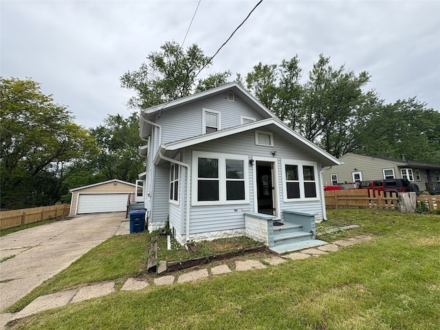 3206 62nd St, Des Moines, IA 50322 - view of front facade with an outbuilding and a garage