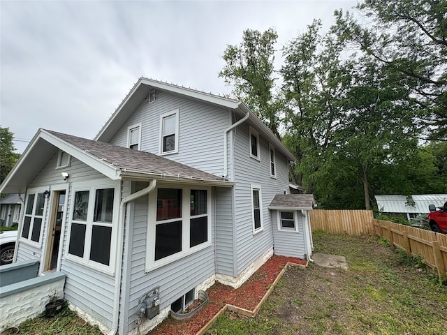 3206 62nd St, Des Moines, IA 50322 - back of house with a shingled roof