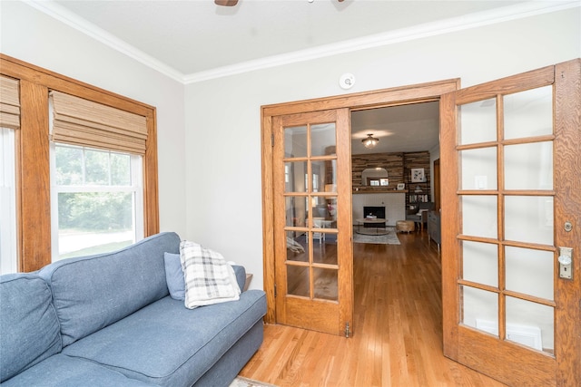 5617 Grand Ave, Des Moines, IA 50312 - living area with wood finished floors and crown molding