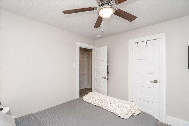 5617 Grand Ave, Des Moines, IA 50312 - bedroom featuring carpet flooring and ceiling fan