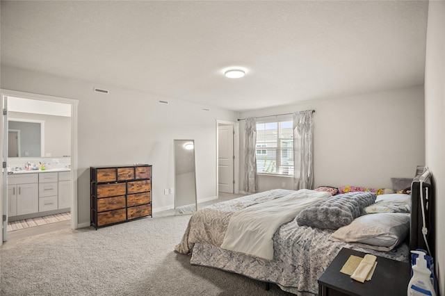 4410 NE Mongoose Ln, Ankeny, IA 50021 - bedroom with light carpet and ensuite bath