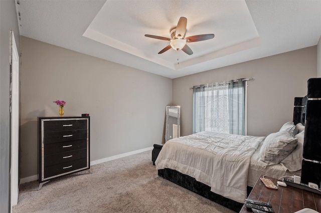 5397 Brook View Ave, Des Moines, IA 50317 - carpeted bedroom with a raised ceiling and ceiling fan