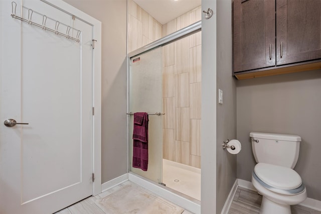 5397 Brook View Ave, Des Moines, IA 50317 - bathroom with baseboards and a stall shower