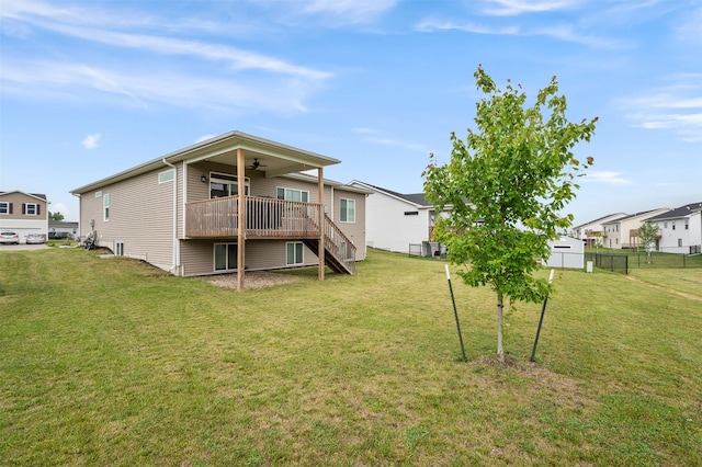 5397 Brook View Ave, Des Moines, IA 50317 - back of house featuring ceiling fan, a deck, and stairs