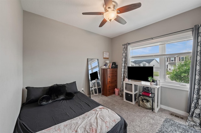 5397 Brook View Ave, Des Moines, IA 50317 - carpeted bedroom with ceiling fan and baseboards