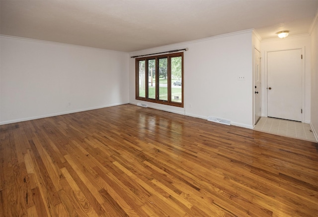 2217 Meadow Ln, West Des Moines, IA 50265 - unfurnished room with hardwood / wood-style floors and crown molding