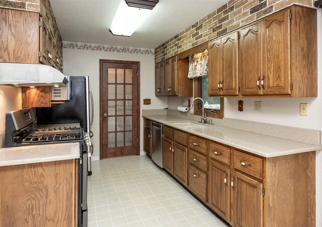 2217 Meadow Ln, West Des Moines, IA 50265 - kitchen with appliances with stainless steel finishes, extractor fan, light countertops, and brown cabinets