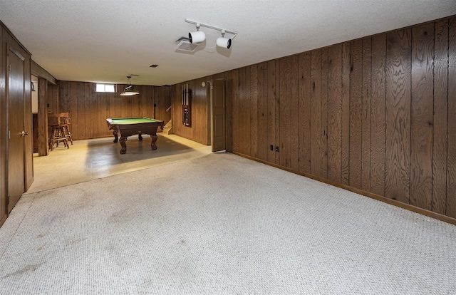 2217 Meadow Ln, West Des Moines, IA 50265 - recreation room with wooden walls, billiards, light colored carpet, and a textured ceiling