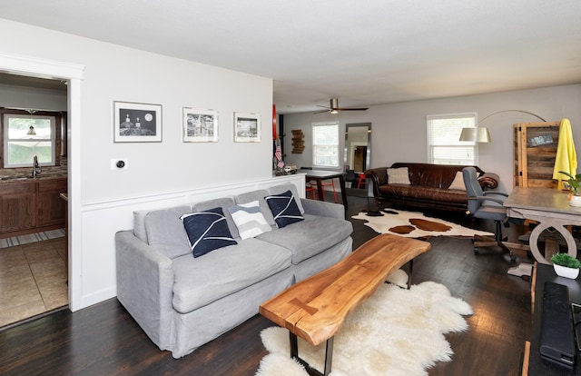 8786 Primrose Ln, Clive, IA 50325 - living room with a ceiling fan and dark wood-type flooring