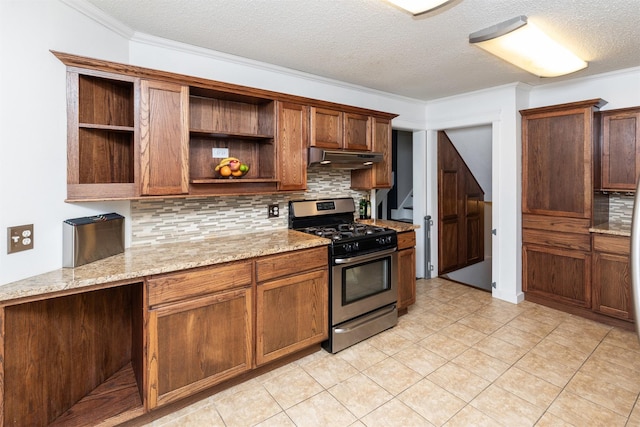 8786 Primrose Ln, Clive, IA 50325 - kitchen with stainless steel gas stove, open shelves, backsplash, under cabinet range hood, and a textured ceiling