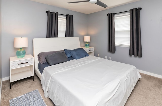 8786 Primrose Ln, Clive, IA 50325 - bedroom with light colored carpet and a ceiling fan
