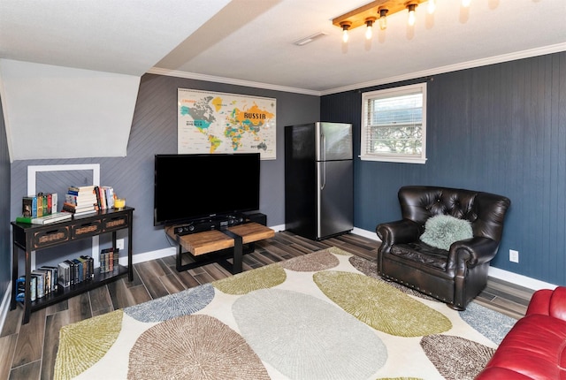 8786 Primrose Ln, Clive, IA 50325 - living room with wood finished floors and crown molding